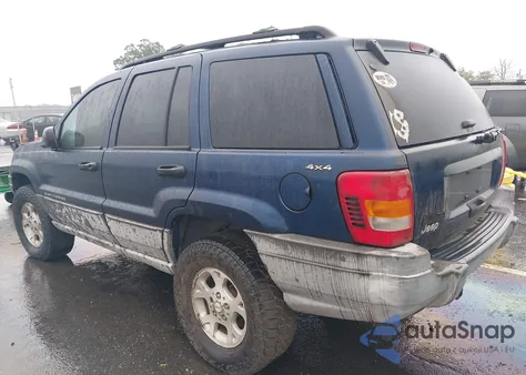 2000 Jeep Grand Cherokee Laredo из США, поврежденный, VIN 1J4GW48S7YC247210